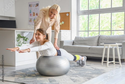 Female physiotherapist work...