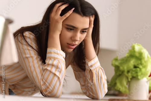 Young woman having panic at...
