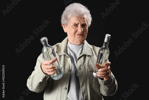 Displeased senior woman wit...