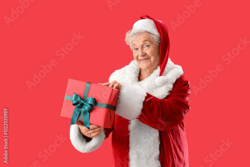 Senior woman dressed as San...