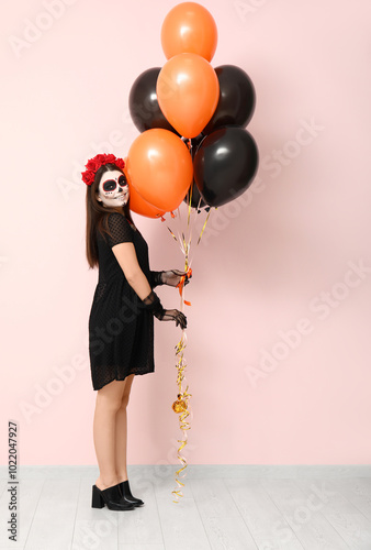 Young woman dressed for Hal...