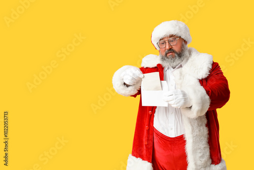 Santa Claus reading letter ...