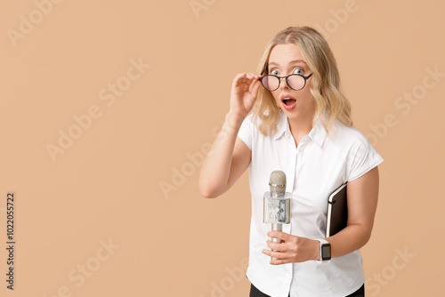 Portrait of shocked female ...