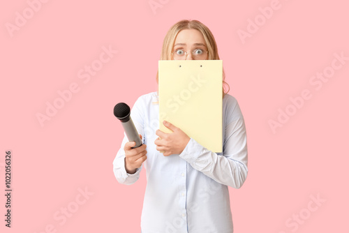 Portrait of shocked female ...