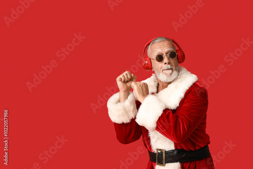 Santa Claus in headphones l...
