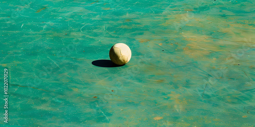 Bola de futebol em um campo verde