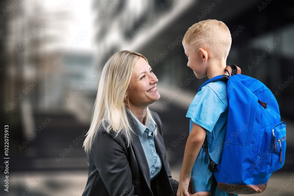 mom accompanies first-grader child to school mom accompanies first-grader child to school