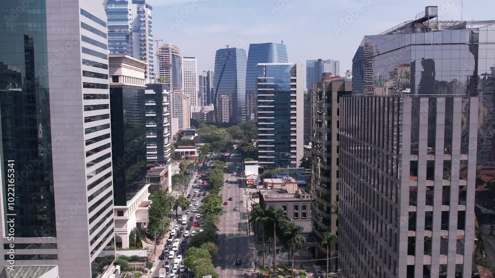 Aerial view of Avenida Brigadeiro Faria Lima, Itaim Bibi. Iconic commercial buildings in the background.