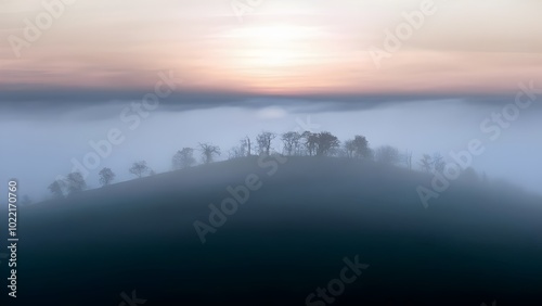 Fog-Shrouded Hill at Dawn