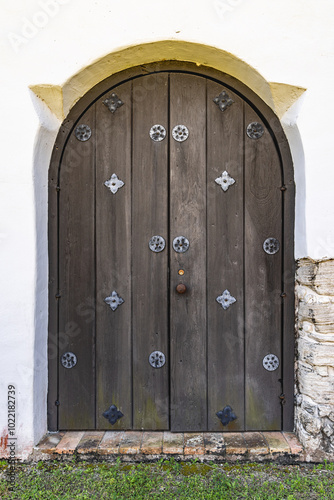 Wooden door on the reconstructed Mission Espiritu Santo at Goliad State Park and Historical Site.