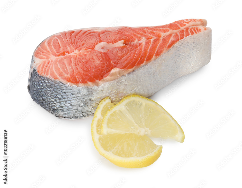 Fresh salmon steak and piece of lemon isolated on white Fresh salmon steak and piece of lemon isolated on white