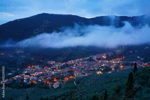 Rainy evening over the village of Buti in Tuscany. photo