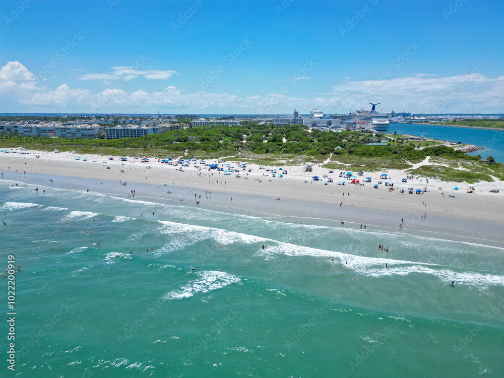 Tourists enjoying a beach day at Jetty Park in Cape Canaveral on Florida's Space Coast in Brevard County Tourists enjoying a beach day at Jetty Park in Cape Canaveral on Florida's Space Coast in Brevard County