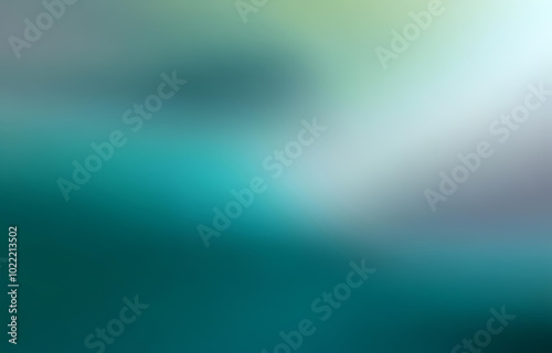 A blurry, abstract background with a gradient of light blue to deep teal.