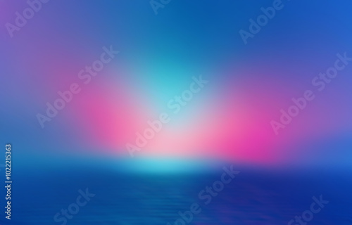 Blurry, horizontal, gradient of pink, blue, and teal colors reflecting on blue water.