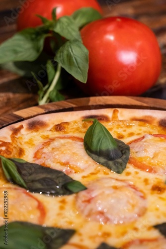 pizza with tomato and basil photo