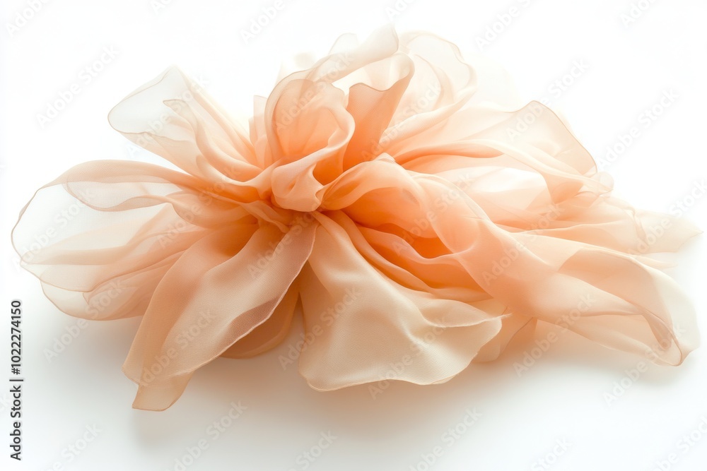 Fototapeta premium A vintage silk flower in muted beige tones dances gracefully in the autumn wind against a soft white backdrop