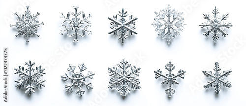 silver snow flakes in different shape. silver snow flake on white background. 