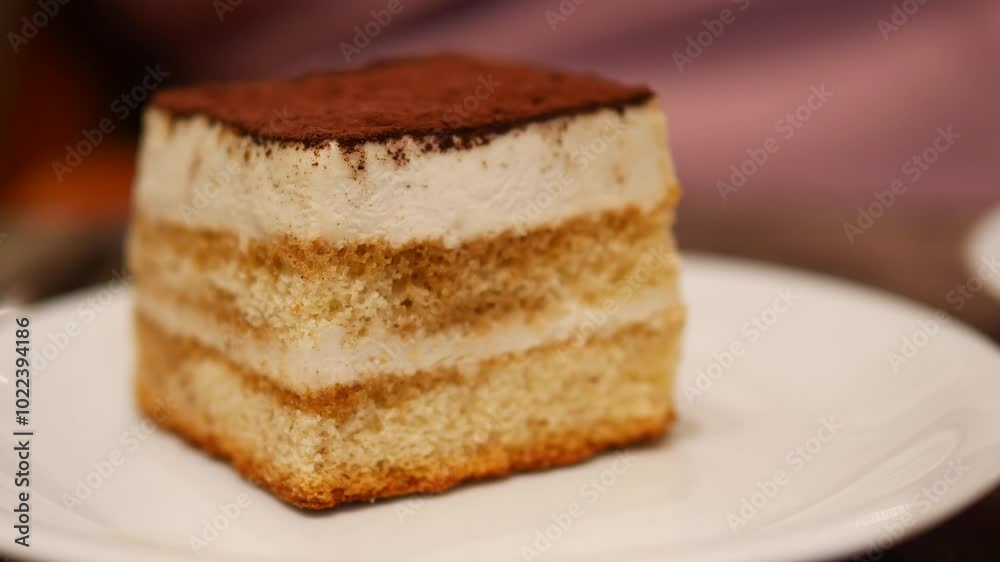 Enjoy a Delicious Layered Cake with Cream and Rich Chocolate Topping, perfect for any occasion Enjoy a Delicious Layered Cake with Cream and Rich Chocolate Topping, perfect for any occasion