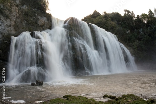 Waihi Falls in New Zealand - Majestic Waterfall in Lush Forest