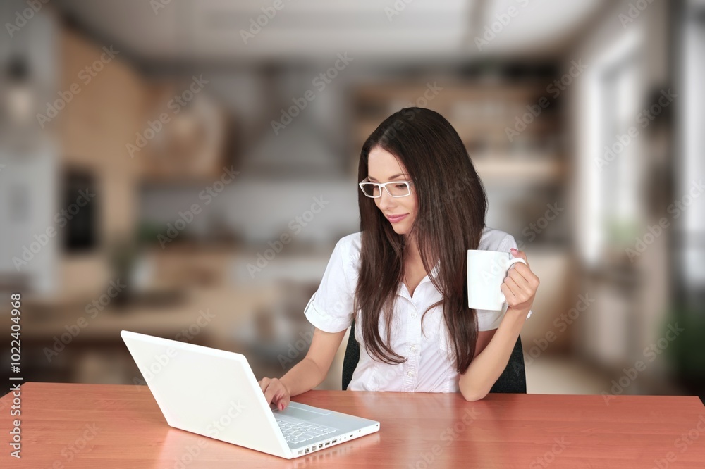 Happy smiling young woman work on laptop Happy smiling young woman work on laptop