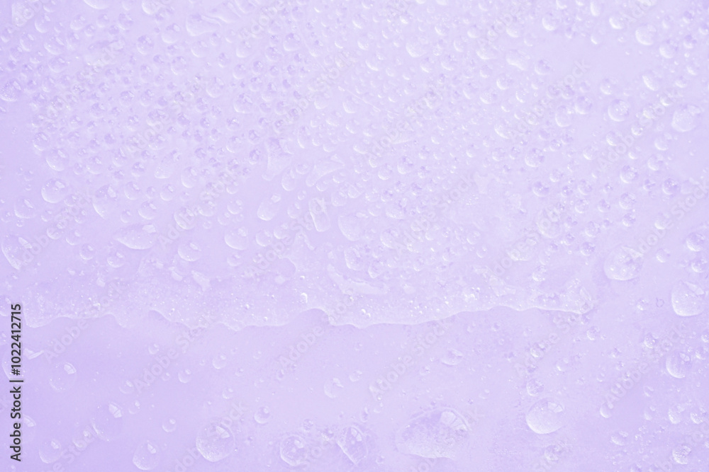 Purple background of water drops from the cold ice in the frozen. Soft blurred sweet purple texture background. Purple background of water drops from the cold ice in the frozen. Soft blurred sweet purple texture background.