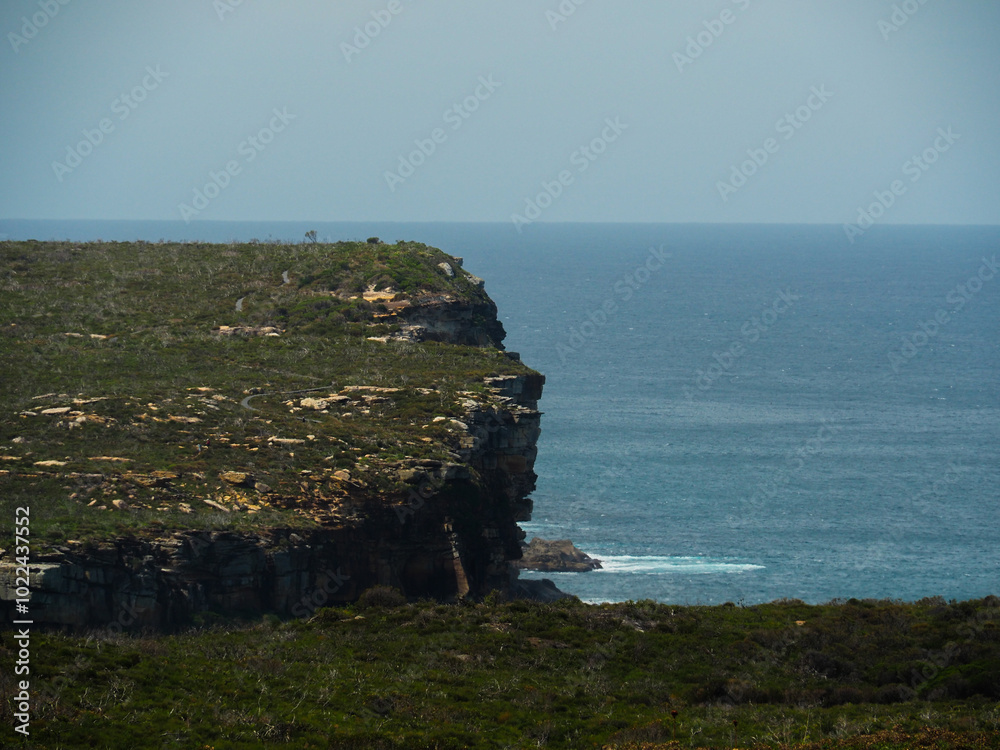 Naklejka premium rocky headland cliff along the coastline