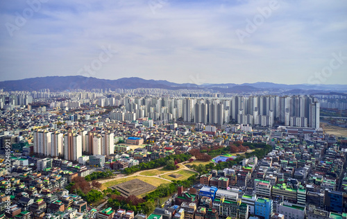 Seokchon-dong, Songpa-gu, Seoul, Korea -November 23, 2019: Aerial view of Seokchon-dong Tombs with the background of housings and apartments. photo