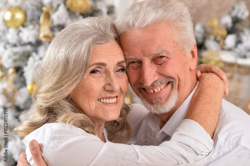 couple old and mature seniors enjoying and having fun together celebrating the new year 