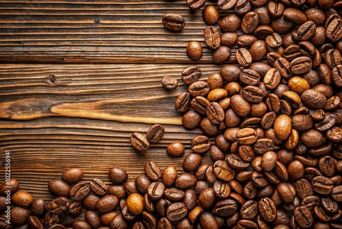 A pile of coffee beans on a wooden surface