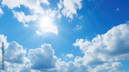 shining blue sky sun clouds