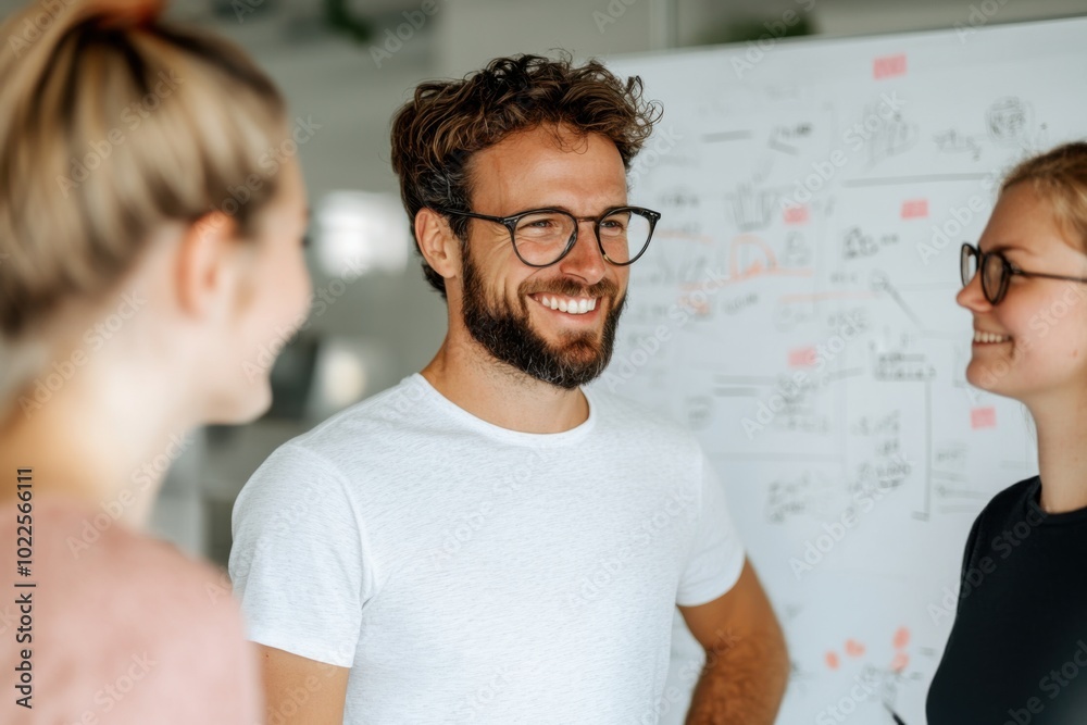 Fototapeta premium Team discussing creative ideas in modern office setting