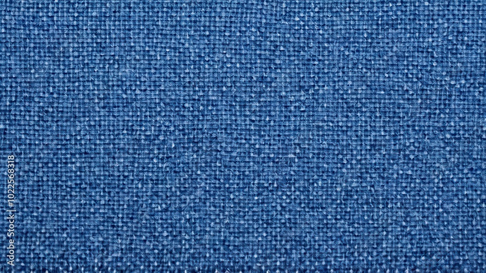 Close-up of sock fabric patterns. Close-up of a dark blue textured fabric with a ribbed pattern, showing intricate details of woven threads, perfect for background or textile design. Close-up of sock fabric patterns. Close-up of a dark blue textured fabric with a ribbed pattern, showing intricate details of woven threads, perfect for background or textile design.