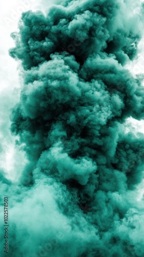 A dense, teal-colored smoke plume rising against a light background.