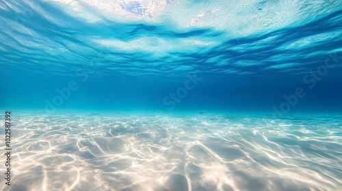 Tropical Blue Ocean with White Sand Underwater in Hawaii: A captivating image of the blue ocean with white sandy seabed, taken in Hawaii, highlighting tropical beauty.