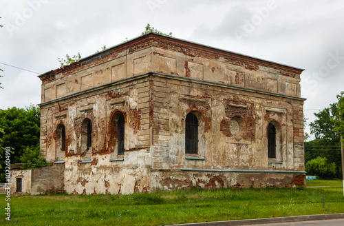 Ruins of an old brick synagogue on a cloudy summer day in Bykhov, Mogilev region, Belarus photo