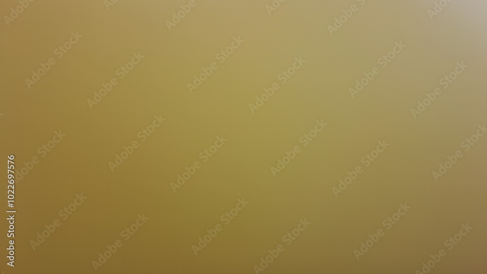 Close up of blurry gold gradations background Close up of blurry gold gradations background