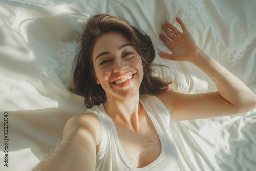Top View of a Happy Woman Waking Up, Stretching Toward the Camera and Smiling in Bed – Good Morning at Home. Generative AI