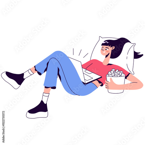 Woman relaxing on pillow with popcorn and laptop