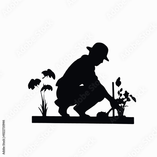 A silhouette of a farmer or gardener working in a field or garden