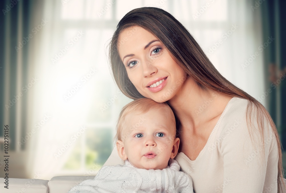 Portrait of Beautiful Mother hold small Baby child Portrait of Beautiful Mother hold small Baby child
