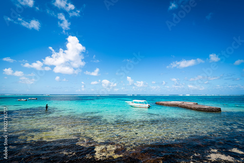 Slika na platnu Beautiful postcard view of a tropical beach at Blue Bay, Mauritius, with coral r