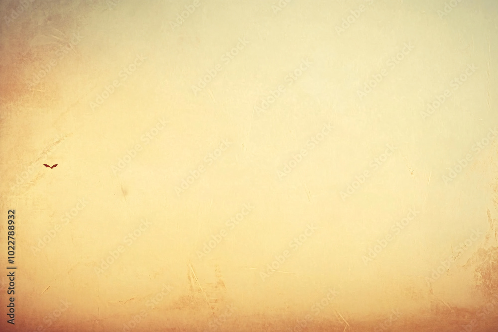 Obraz premium Faded orange sky with a soft gradient transitioning from warm orange tones to a lighter hue creating a vintage atmosphere 