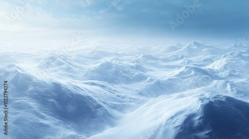 A scenic view of snow-covered mountain peaks with a bright blue sky.