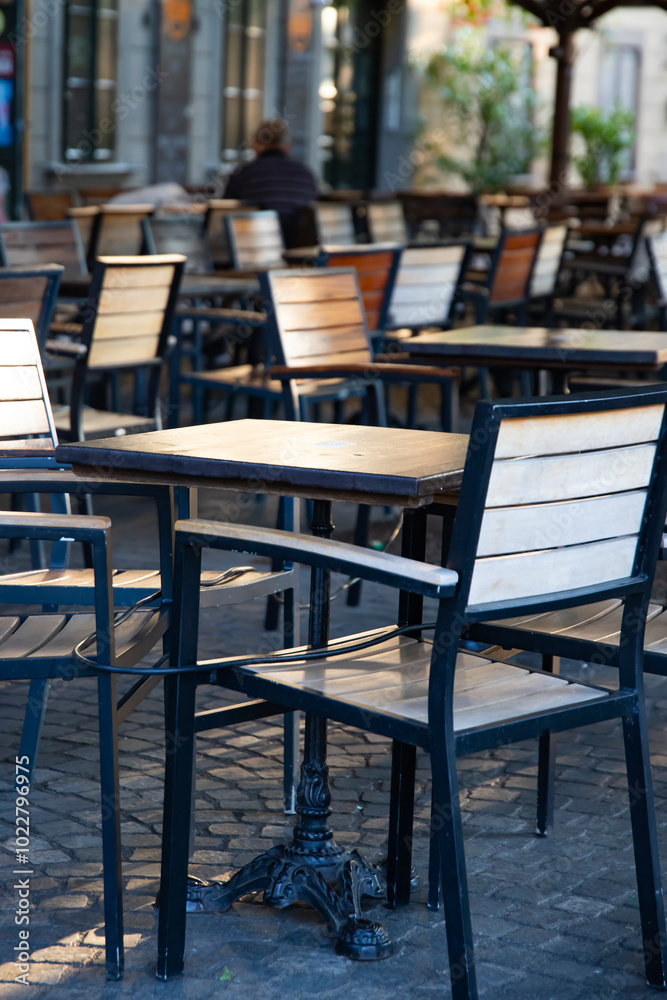 Cozy terrace with tables of cafe in Ljubljana, Slovenia Cozy terrace with tables of cafe in Ljubljana, Slovenia