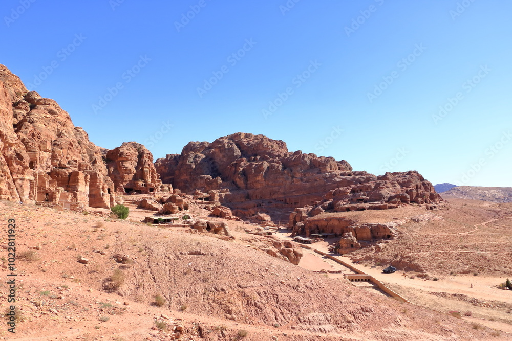 Petra, Wadi Musa, Jordan - May 13 2024: people visiting Petra, Panoramic aerial view Petra, Wadi Musa, Jordan - May 13 2024: people visiting Petra, Panoramic aerial view