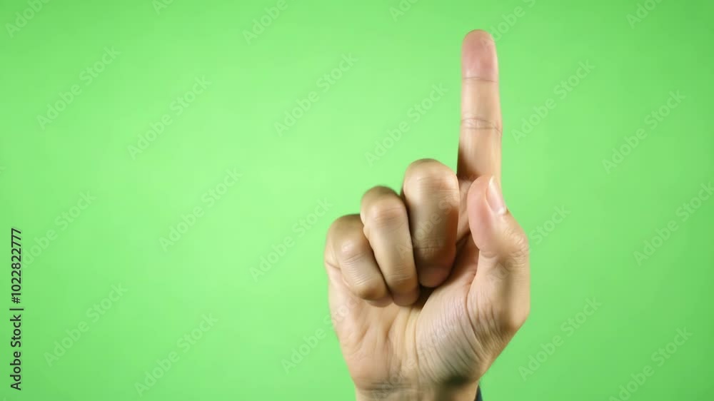 Hand gesture on green background, isolated hand signal for communication and body language. Simple and bold symbol for signs, gestures, and non-verbal interaction, suitable for educational purposes