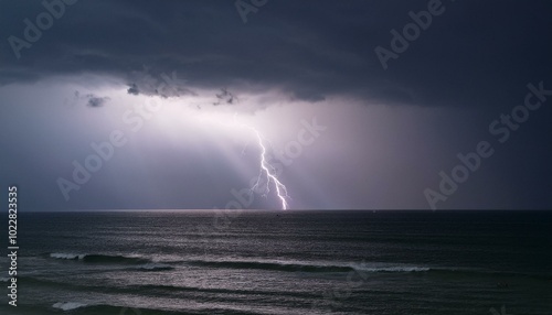 a calm sea under a light storm, with gentle waves and distant lightning illuminating the soft clouds in muted purples and grays.