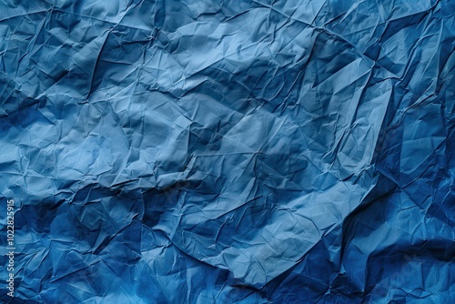 Wallpaper Mural Crumpled blue paper texture with deep folds and varying shades Torontodigital.ca