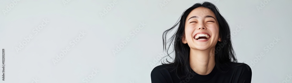 Asian woman laughing while handling customer inquiries in a bright retail environment, friendly and welcoming atmosphere, asian woman, working, joyful Asian woman laughing while handling customer inquiries in a bright retail environment, friendly and welcoming atmosphere, asian woman, working, joyful
